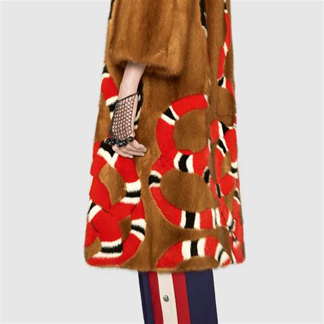 gucci fur coat white snake|white gucci handbag.